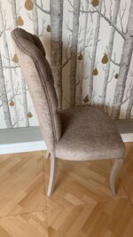 Sedia schienale capitonnè gambe sciabola laccate